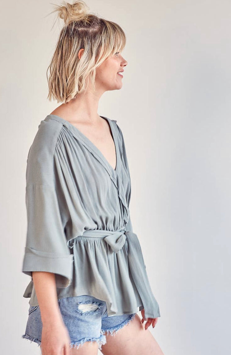Wrap front belted top