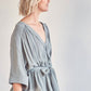 Wrap front belted top