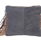 Monochromatic motif hand tooled bag