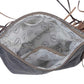 Monochromatic motif hand tooled bag
