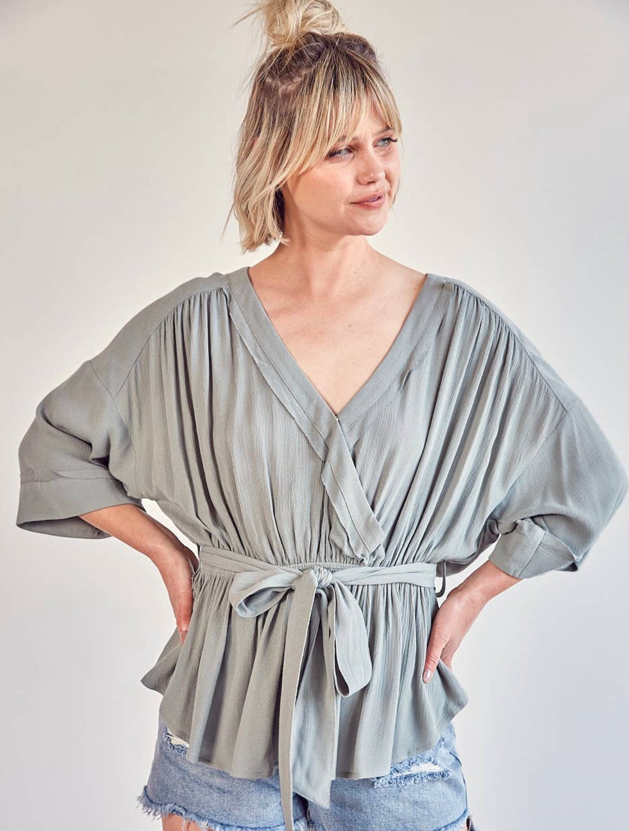 Wrap front belted top